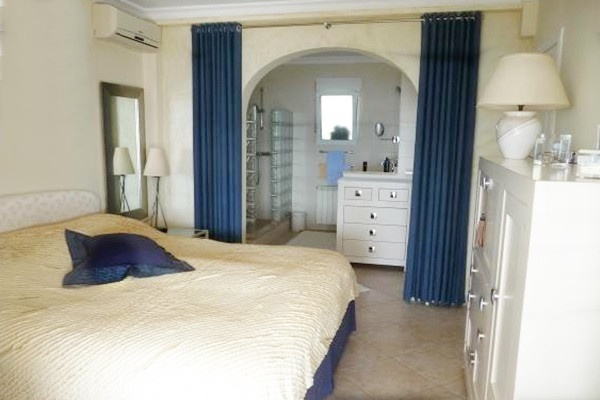 One of the elegant bedrooms with bathroom en suit