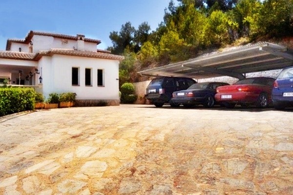 The driveway with carport